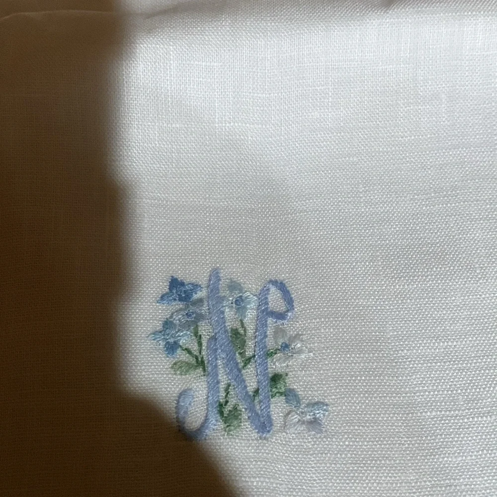 And beautiful hand made rare linen pouch with letter N hand dawn. Brand new!